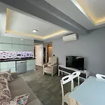 X Ξενοδοχείο με διαμερίσματα Φετιγιέ